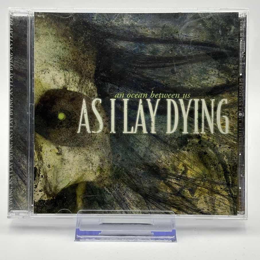 As-I-Lay-Dying--An-Ocean-Between-Us-Used-CD