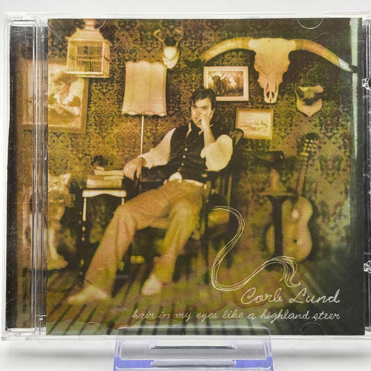 Corb-Lund--Hair-In-My-Eyes-Like-A-Highland-Steer-Used-CD